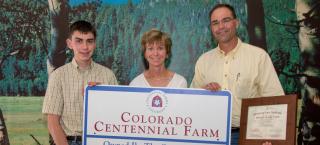 Schenk Family Farm members with their Centennial Farm award.