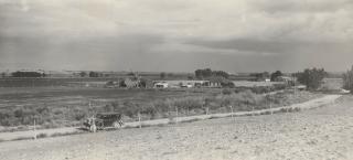 A wide view of the Westesen Farm & Ranch in 1929 with the family Buick Roadster in the foreground.