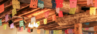 Fort Garland interior ceiling covered in papel picado