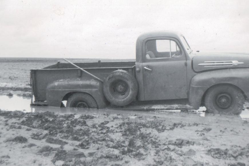 Smith Ranch truck stuck in the mud, 1959.