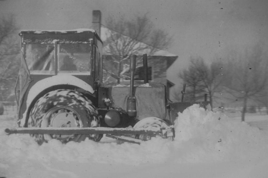Tractor plowing snow, 1960.