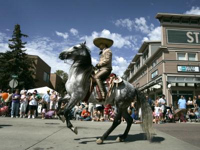 Jose Galvan dances his horse down Main Street in Louisville during the 72nd Annual Labor Day Parade in 2007