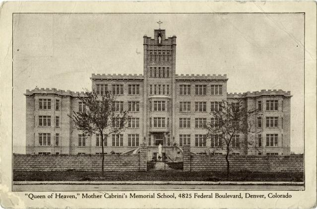 Image of the "Queen of Heaven" Mother Cabrini Memorial School which was built at 4825 Federal Boulevard in Denver. The building is a large brick structure with between 4 and 5 stories--the left- and right-most wings are shorter than the central building structure. It has a tall tower standing on the roof, directly above the center main door, and atop the tower is a sizeable cross above a statue.